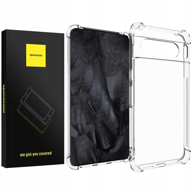 Przezroczyste silikonowe etui na telefon z widocznymi wzmocnieniami na rogach. Obok znajduje się czarne pudełko z żółtym logo \'spacecase\' i napisem \'we got you covered\'.