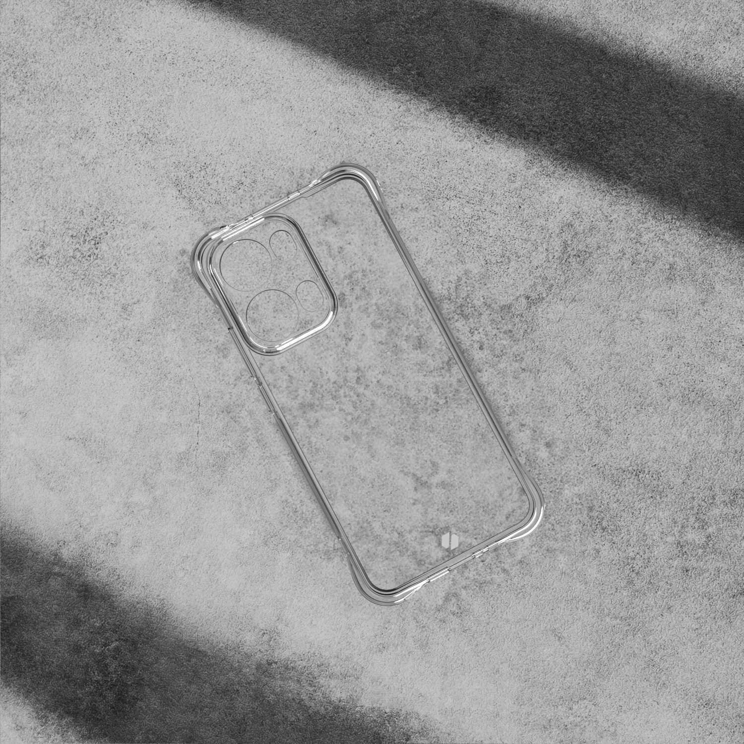 Przezroczyste silikonowe etui na telefon z wycięciami na aparat, leży na betonowej powierzchni. Na etui widoczne jest małe logo w dolnej części.