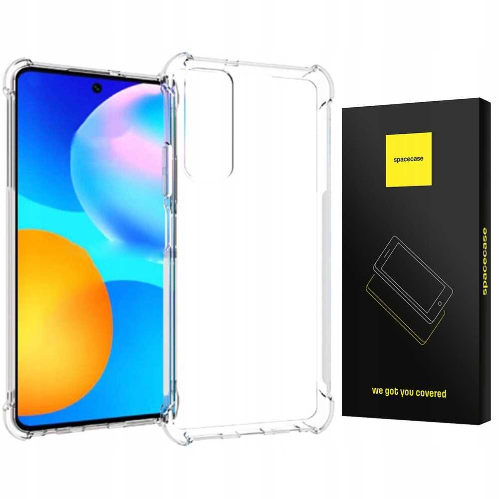 Przezroczyste silikonowe etui na telefon obok czarnego pudełka z żółtym logo \'spacecase\' i napisem \'we got you covered\'.