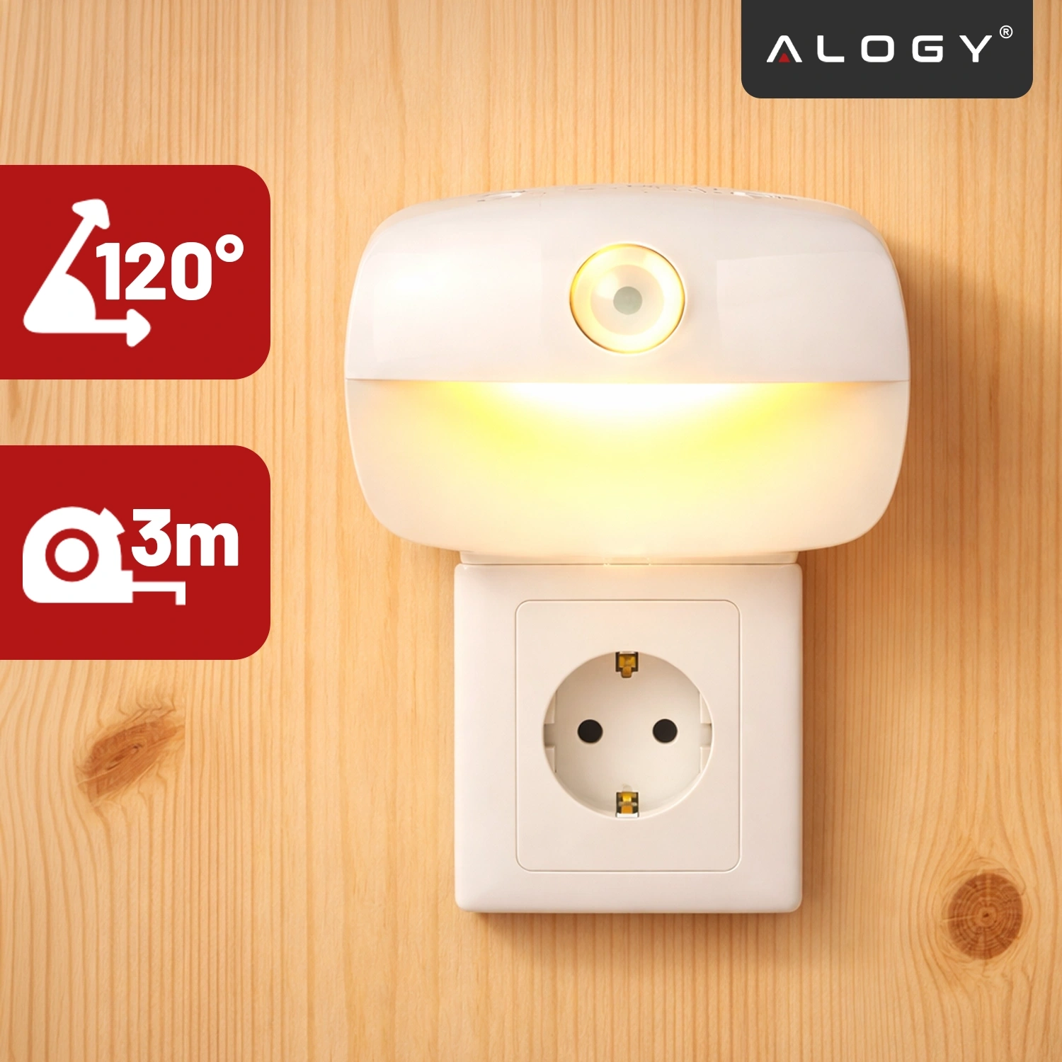 Na drewnianej ścianie zamontowana jest biała lampka nocna z czujnikiem ruchu, pod którą znajduje się gniazdko elektryczne. Obok widoczne są ikony z napisami \'120°\' i \'3m\', a w prawym górnym rogu logo \'ALOGY\'.