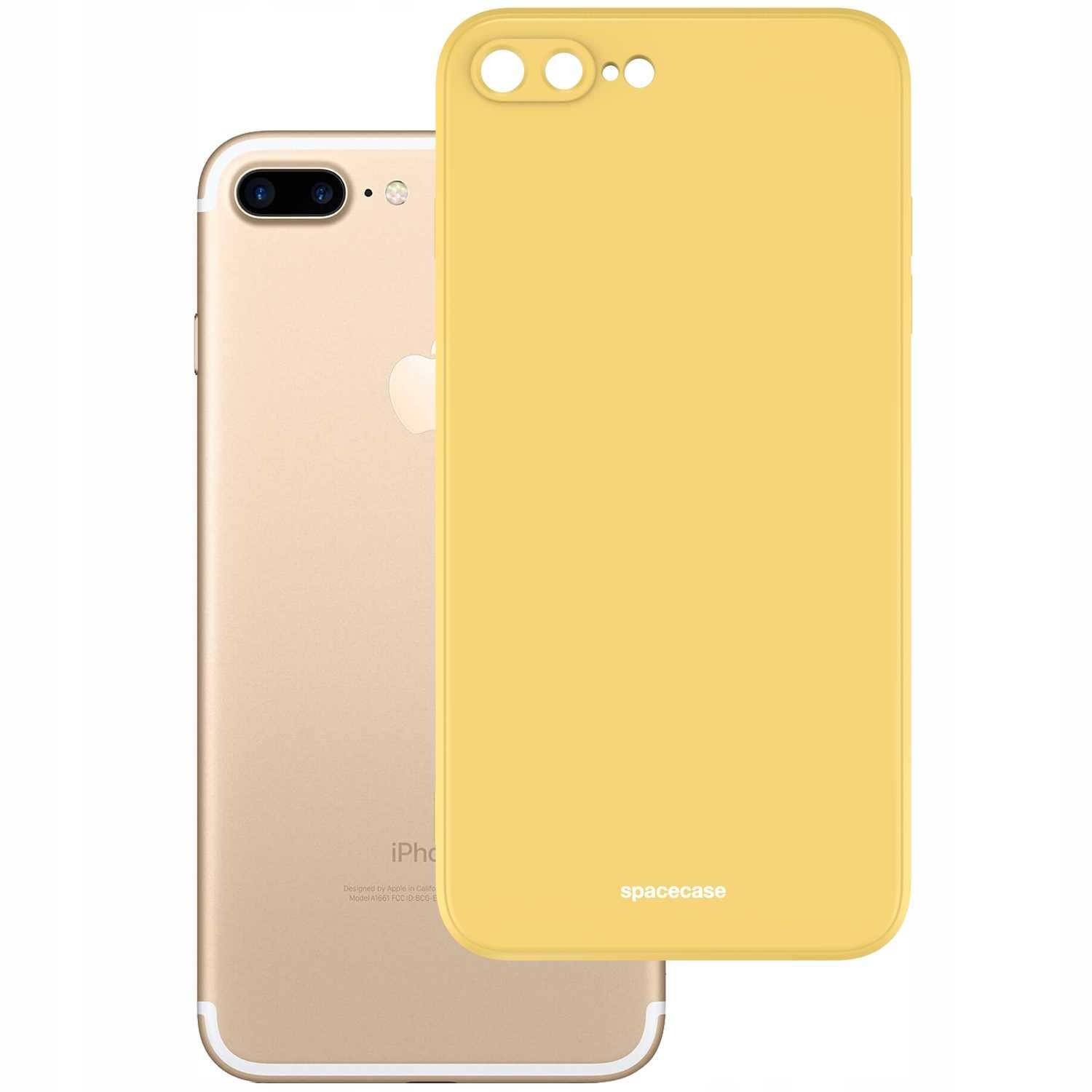 Na obrazie widoczne jest żółte silikonowe etui z napisem \'spacecase\', obok złotego telefonu z logo jabłka. Etui ma wycięcia na aparat i przyciski.