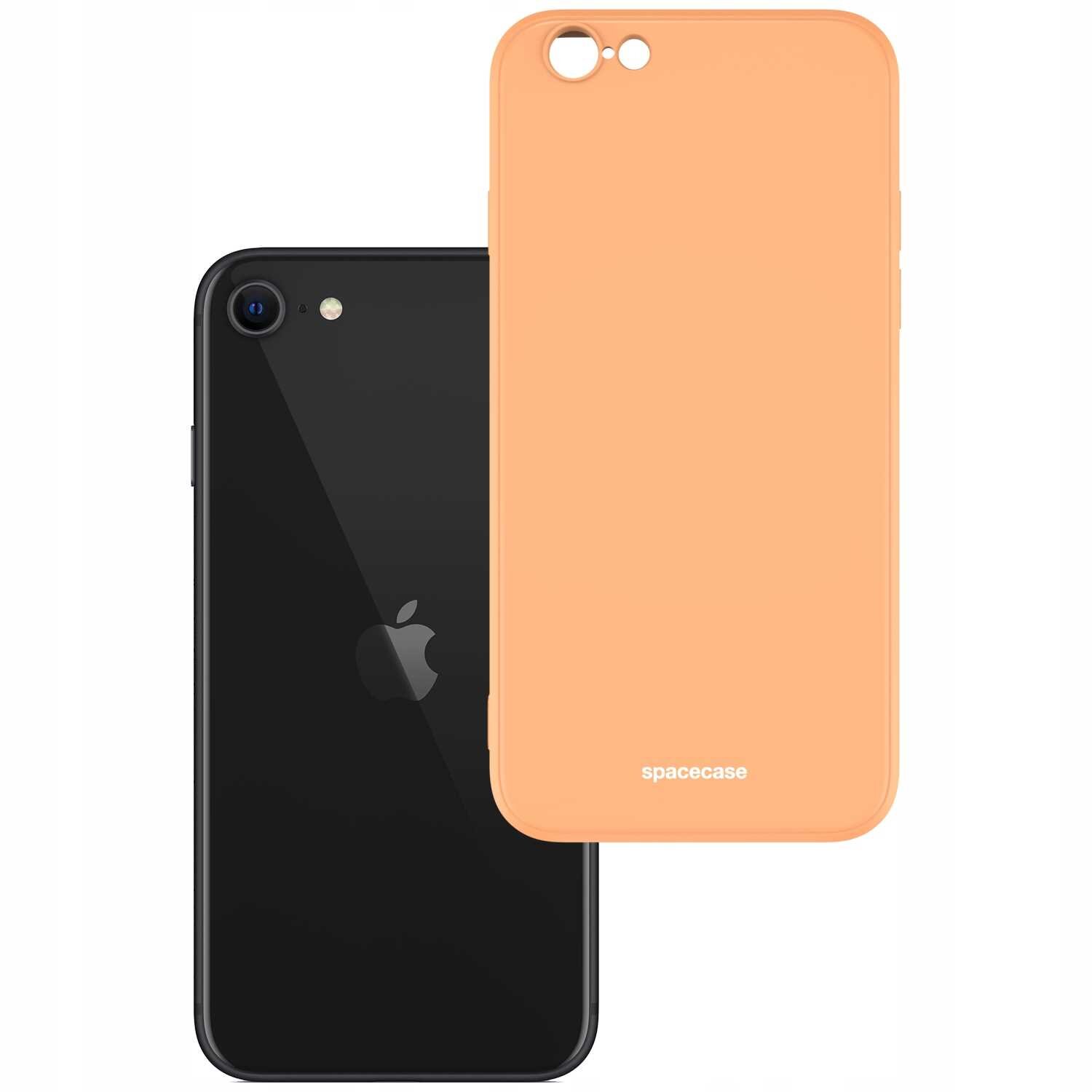 Na obrazie widoczne jest pomarańczowe silikonowe etui z napisem \'spacecase\' oraz czarny smartfon z logo w kształcie jabłka.