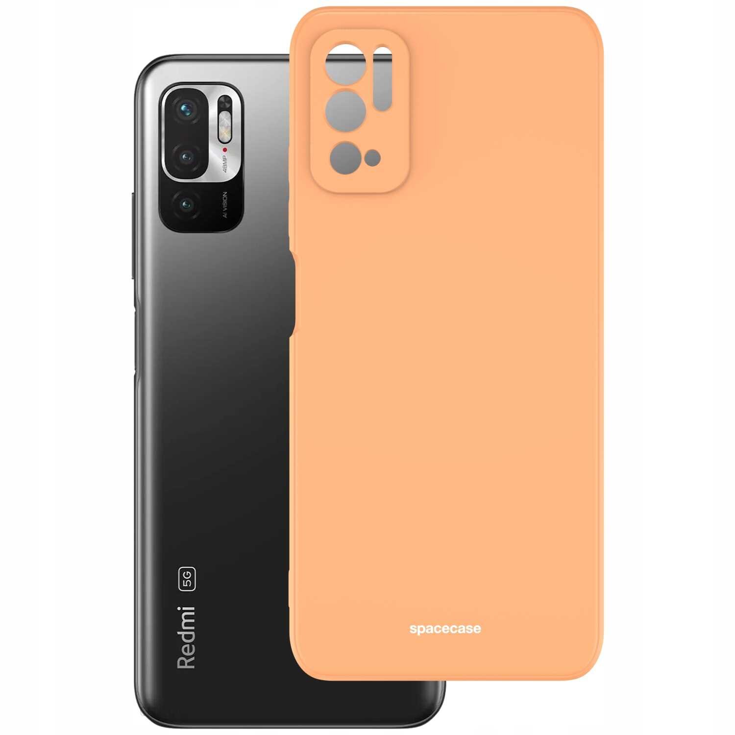 Obraz przedstawia pomarańczowe silikonowe etui z wycięciami na aparat i logo \'spacecase\'. Obok znajduje się czarny telefon z widocznym napisem \'Redmi 5G\'.