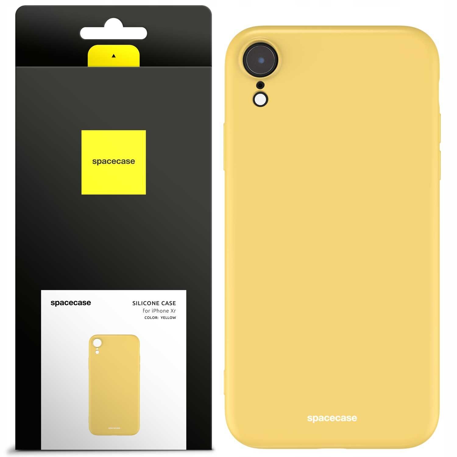 Żółte silikonowe etui na telefon z wycięciem na aparat, obok opakowanie z logo \'spacecase\'.