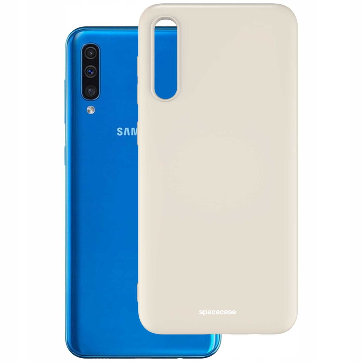 Na obrazie widoczne jest beżowe silikonowe etui z napisem \'spacecase\', umieszczone przed niebieskim telefonem z logo \'SAMSUNG\'.