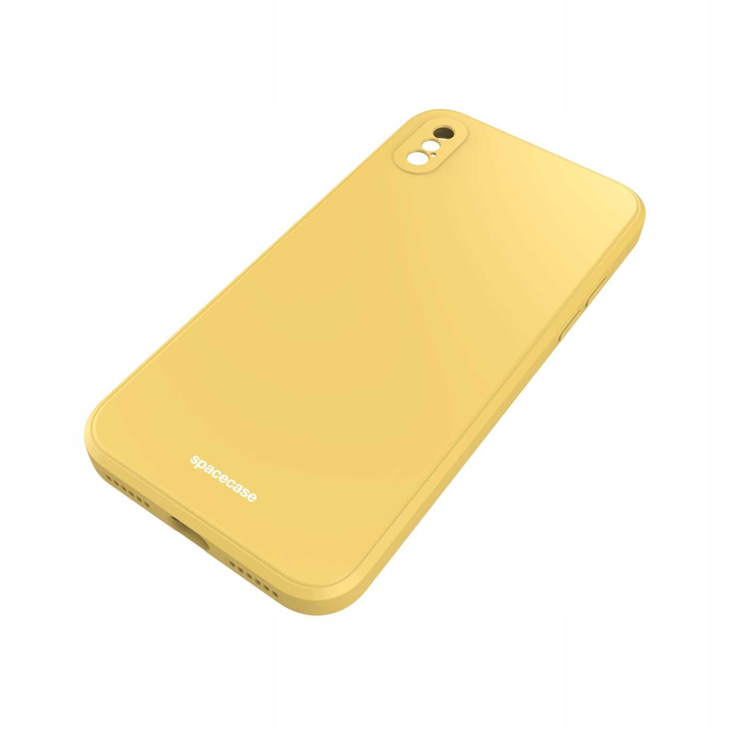 Żółte silikonowe etui na telefon z wycięciami na aparat i logo \'spacecase\' na dole.