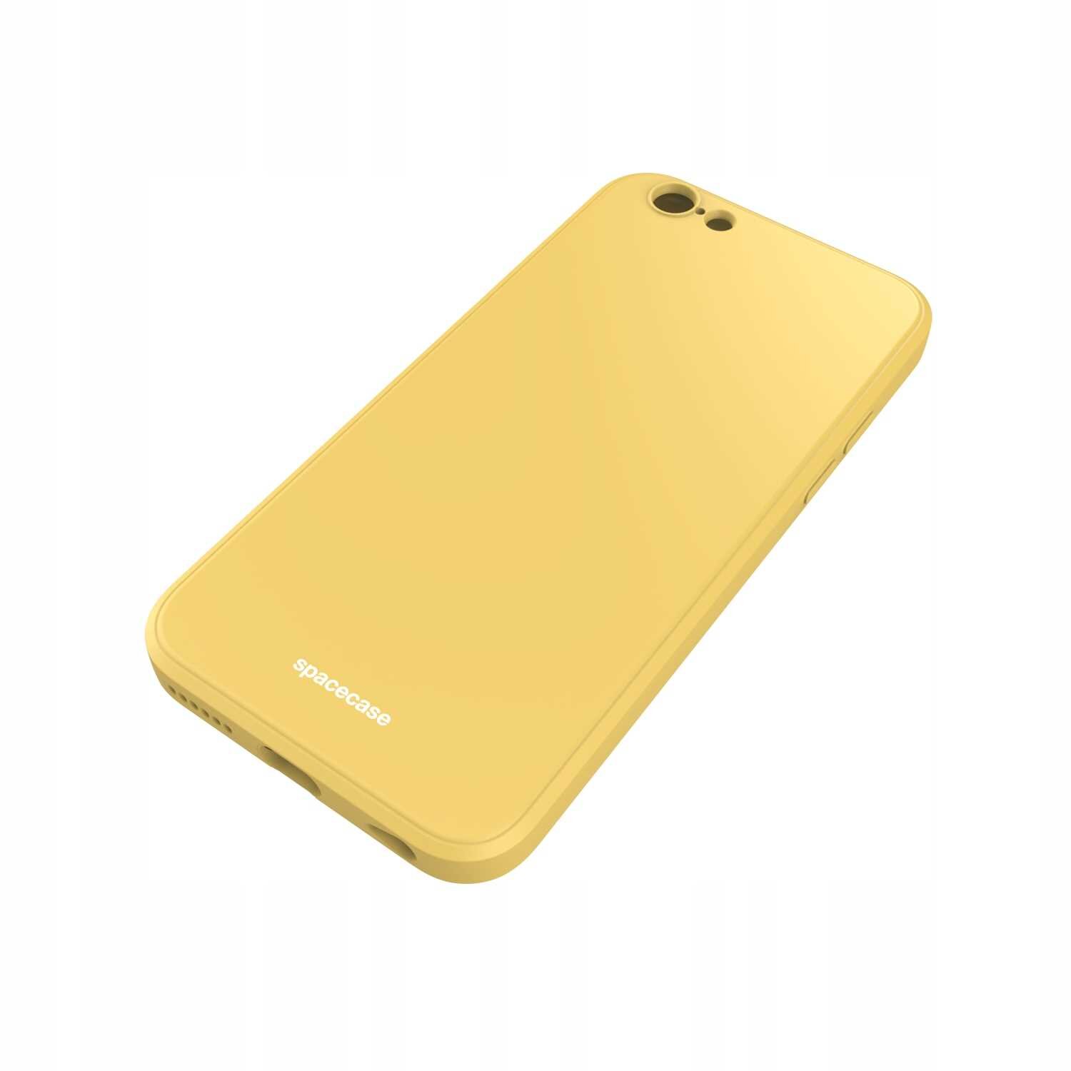 Żółte silikonowe etui na telefon z napisem \'spacecase\' na dole. Etui ma otwory na aparat i przyciski.