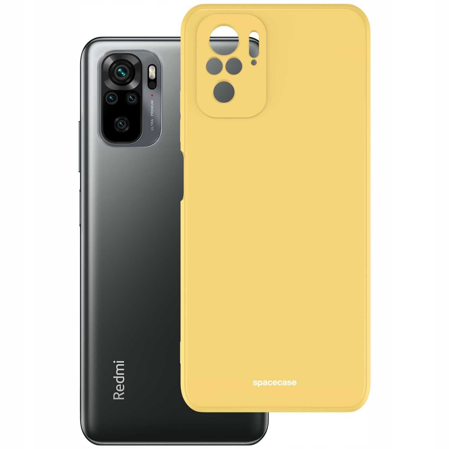 Na obrazie widoczny jest czarny smartfon z logo \'Redmi\' oraz żółte silikonowe etui z napisem \'spacecase\'.
