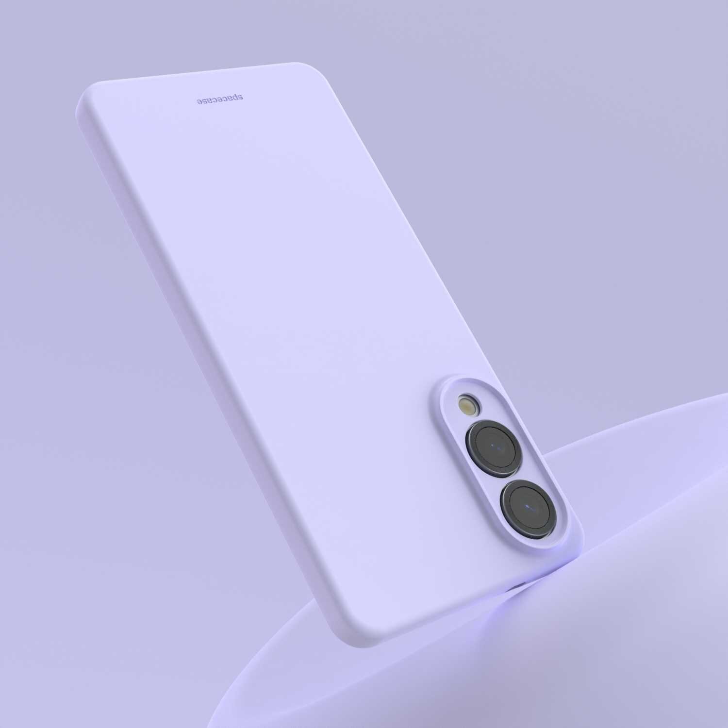 Fioletowe silikonowe etui na telefon z dwoma okrągłymi wycięciami na aparaty i jednym na lampę błyskową. Na etui widoczne jest logo \'spacecase\'.