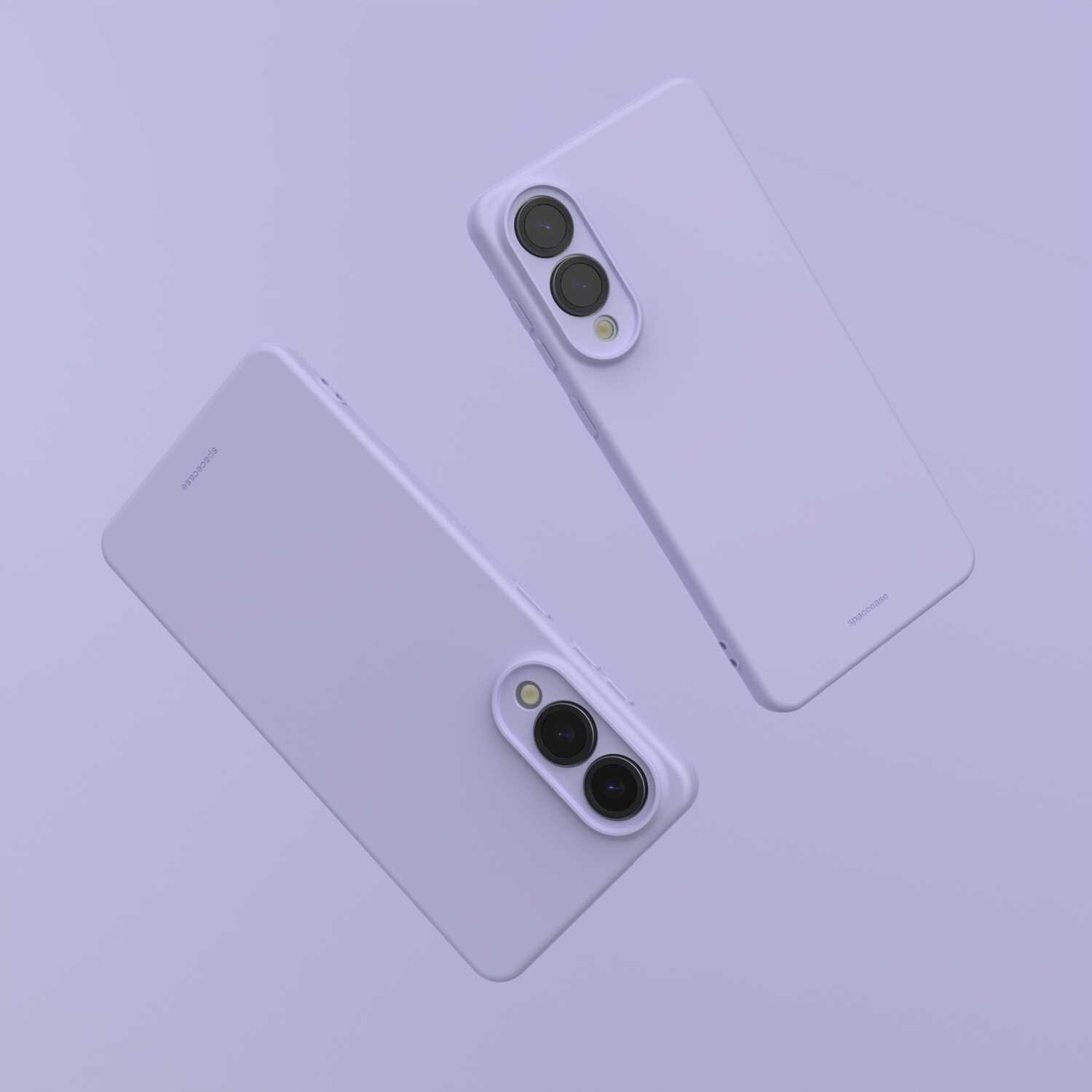 Dwa fioletowe etui na telefon z widocznymi wycięciami na aparaty fotograficzne. Na etui widoczne jest logo \'SPACECASE\'.