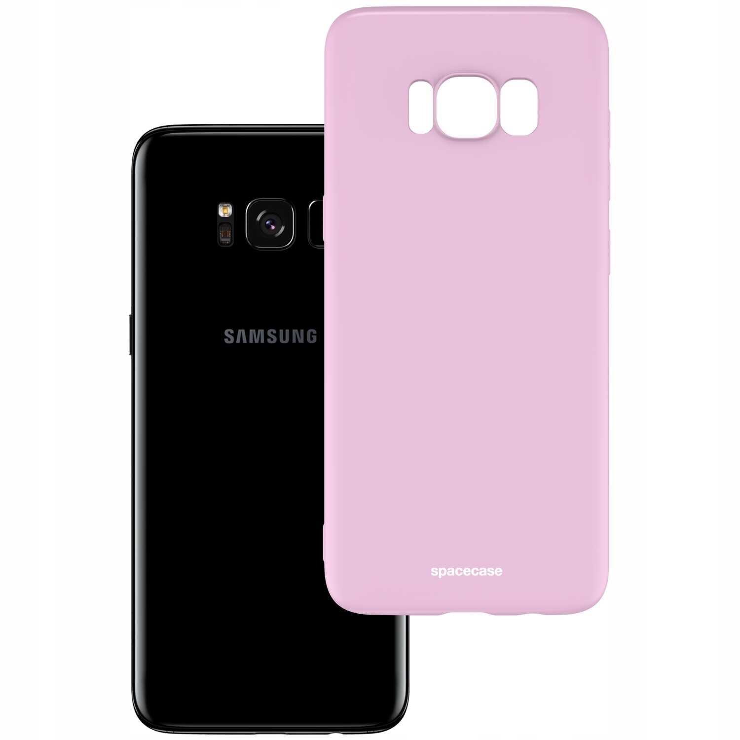 Na obrazie widoczne jest różowe silikonowe etui z wycięciami na aparat i przyciski, obok czarnego smartfona z logo \'SAMSUNG\'. Na etui znajduje się napis \'spacecase\'.