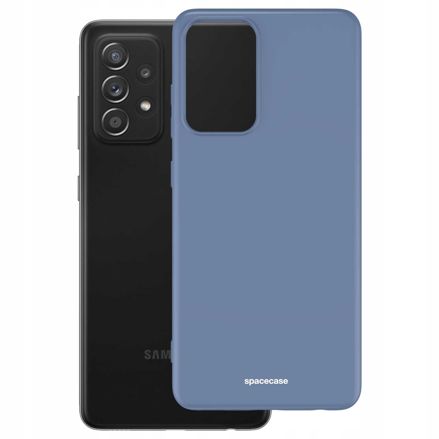 Na obrazie widoczne jest niebieskie silikonowe etui na telefon z napisem \'spacecase\'. Etui jest umieszczone przed czarnym telefonem z widocznymi aparatami fotograficznymi.
