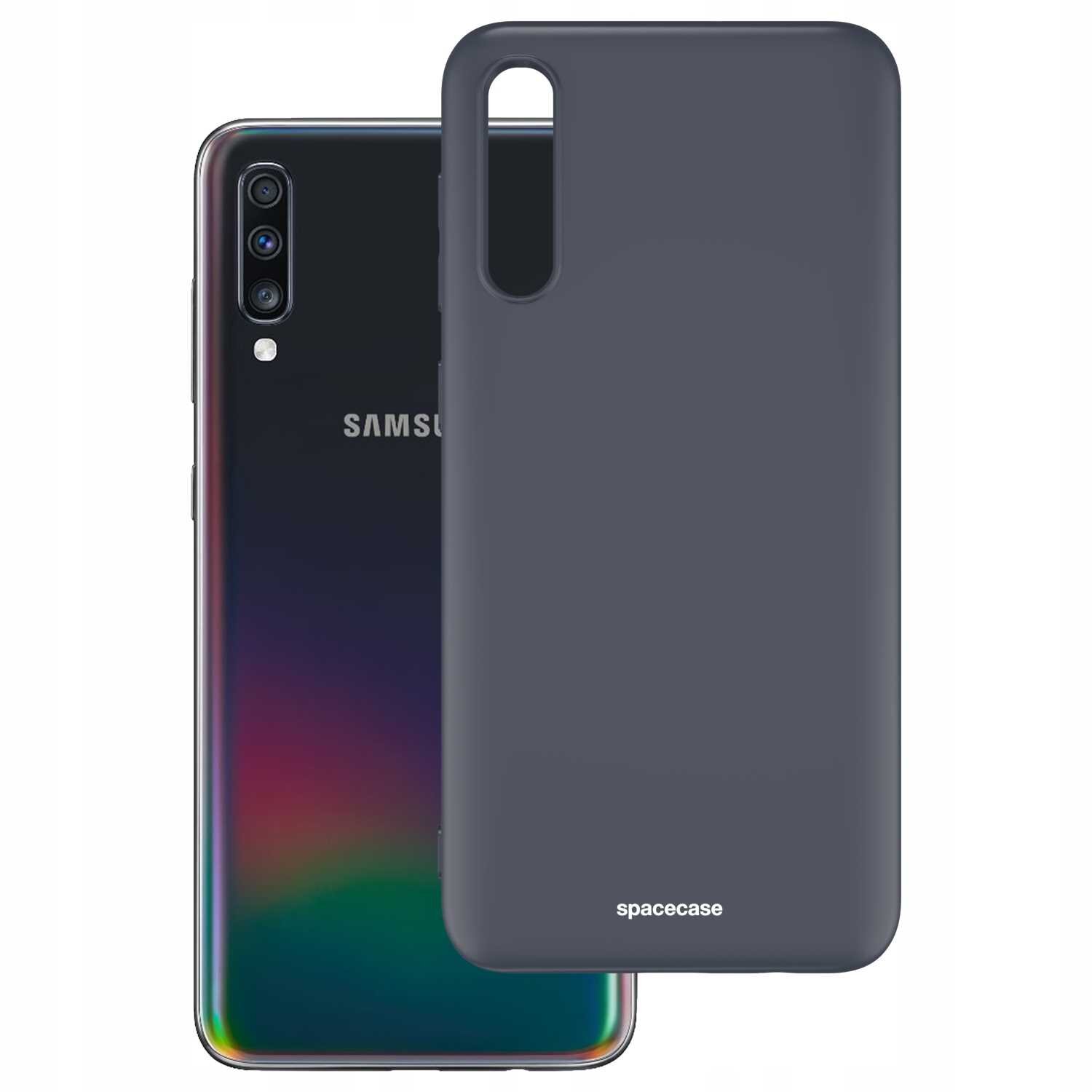Na obrazie widoczne jest czarne silikonowe etui z napisem \'spacecase\', obok telefonu z logo \'SAMSUNG\'.