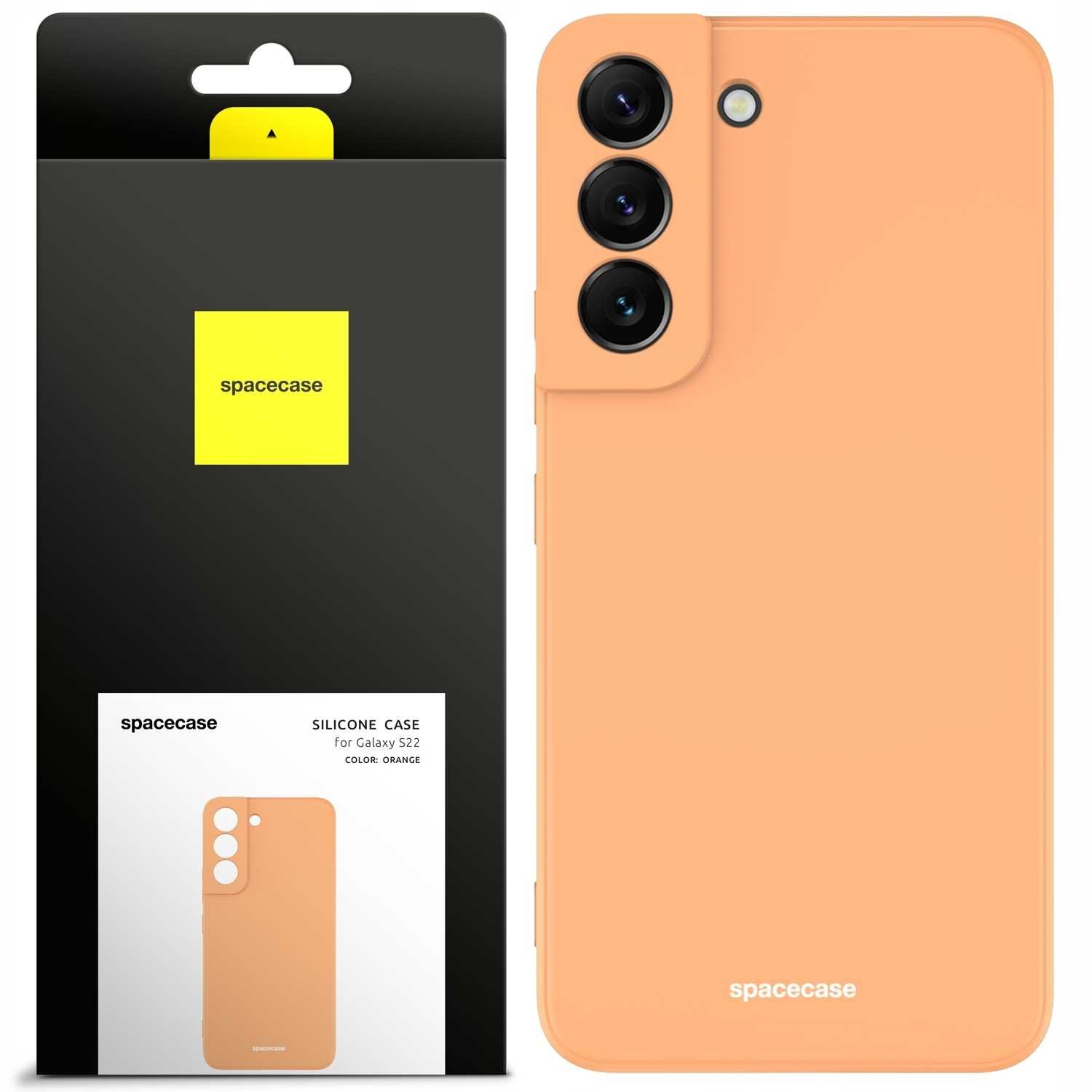Obraz przedstawia pomarańczowe silikonowe etui na telefon z trzema otworami na aparaty. Obok znajduje się opakowanie z logo \'spacecase\' i napisem \'SILICONE CASE for Galaxy S22 COLOR: ORANGE\'.