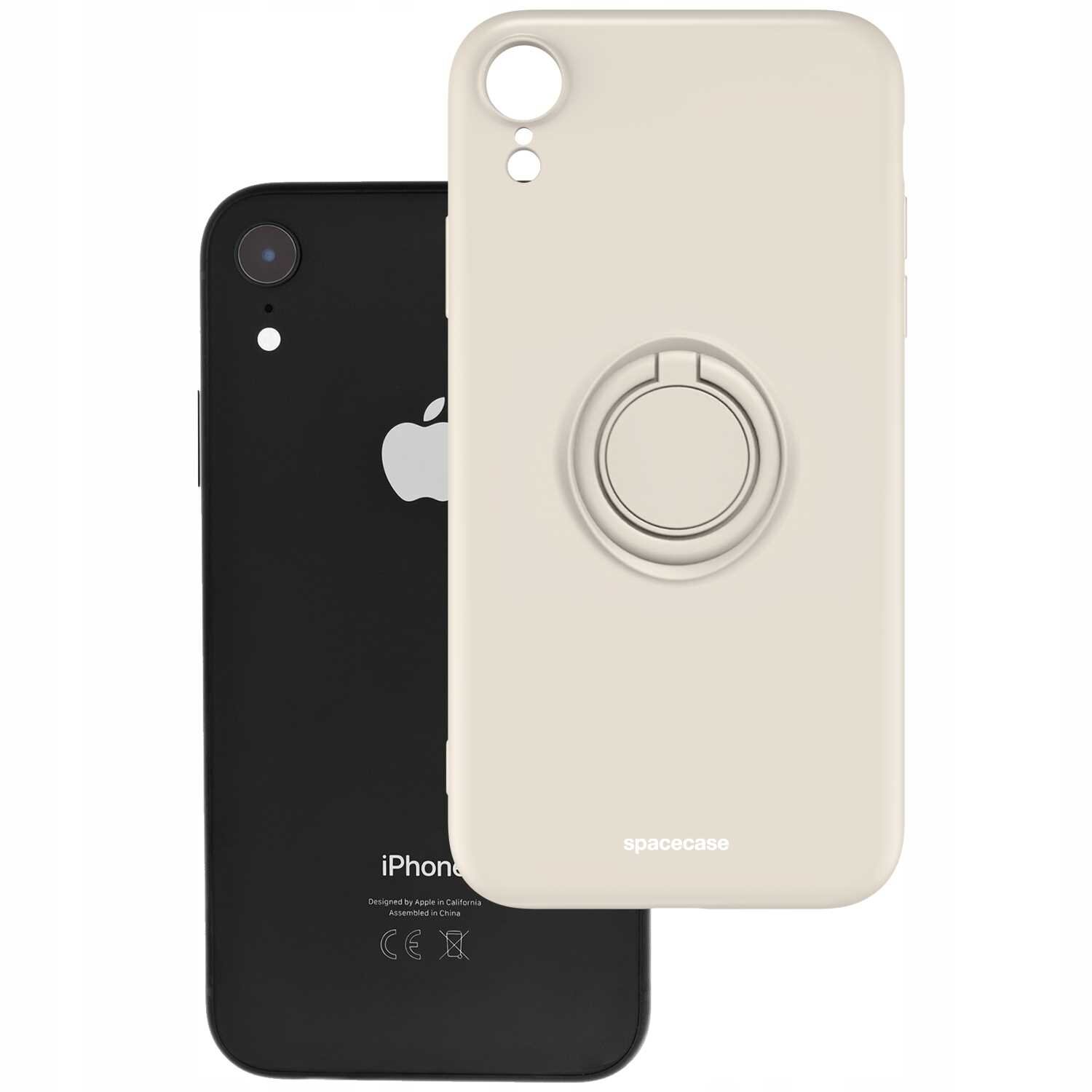 Na obrazie widoczne jest beżowe silikonowe etui z pierścieniem, oznaczone napisem \'spacecase\', oraz czarny telefon z logo jabłka. Telefon ma napis \'iPhone\' na dole obudowy.