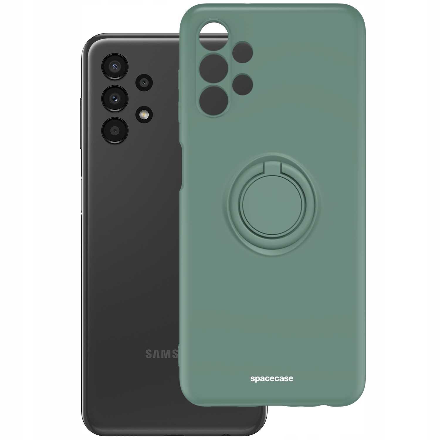 Zielone silikonowe etui z pierścieniem na tylnej stronie, obok czarnego telefonu z widocznymi aparatami. Na etui widoczny jest napis \'spacecase\'.