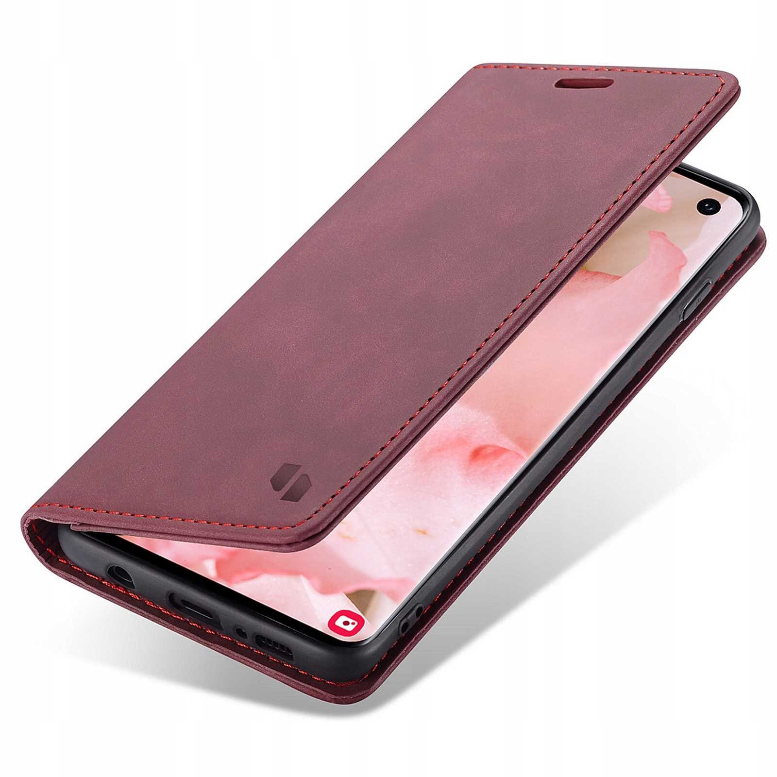 Czerwone etui z klapką na smartfon, z widocznym logo producenta. Telefon w środku wyświetla różowy motyw na ekranie.