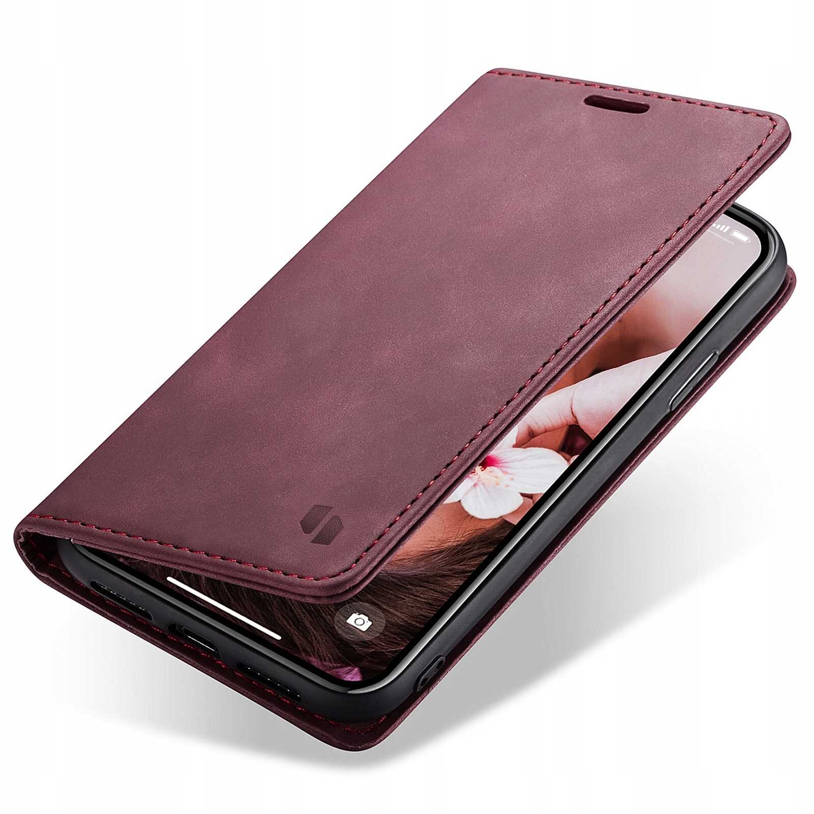 Czerwone etui z klapką na telefon, z widocznym logo producenta. Wewnątrz etui znajduje się telefon z wyświetlonym zdjęciem kwiatu.