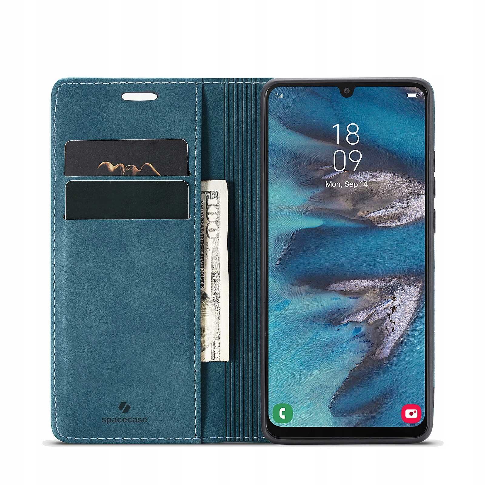 Etui z klapką w kolorze niebieskim z miejscem na karty i banknoty, obok znajduje się smartfon z wyświetlaczem pokazującym godzinę 18:09 i datę Mon, Sep 14. Na etui widoczne jest logo \'spacecase\'.