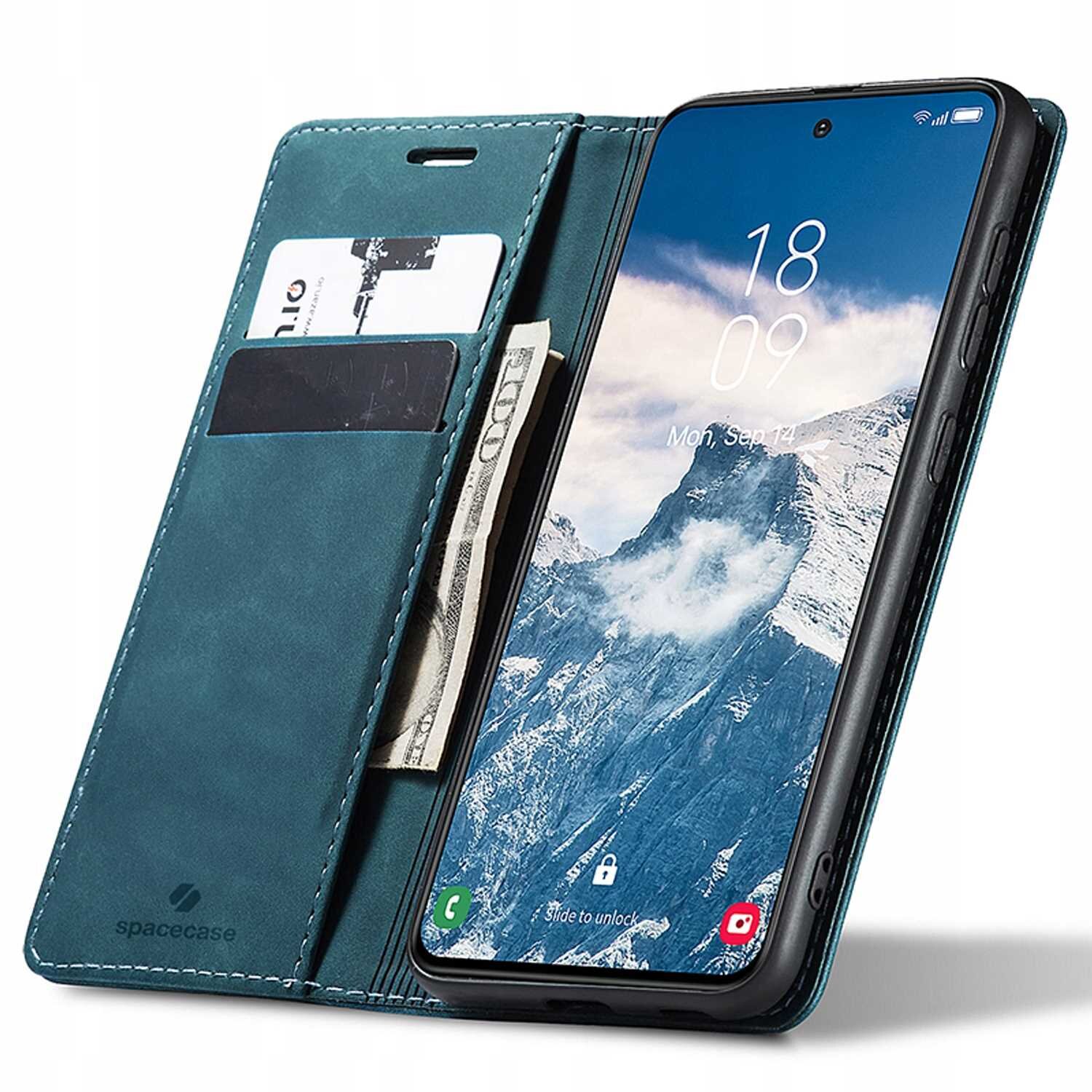 Etui z klapką w kolorze niebieskim z miejscem na karty i banknoty, obok znajduje się telefon z wyświetlaczem pokazującym godzinę 18:09 i datę Mon, Sep 12. Na etui widoczne jest logo \'spacecase\'.