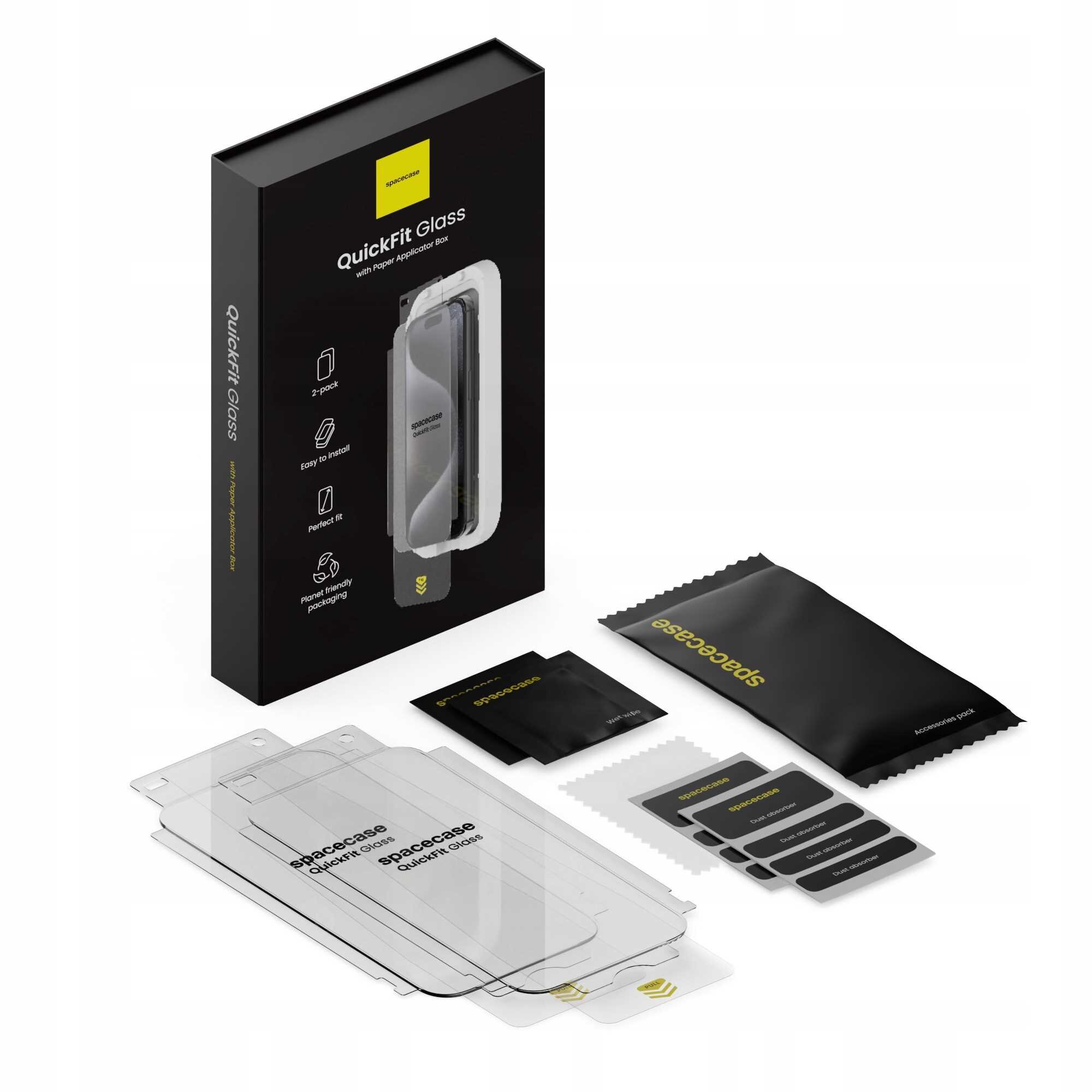 Na obrazie znajduje się opakowanie produktu QuickFit Glass z widocznym szkłem hartowanym i aplikatorem. Obok opakowania leżą akcesoria, takie jak ściereczki i naklejki, wszystkie oznaczone logo \'spacecase\'.