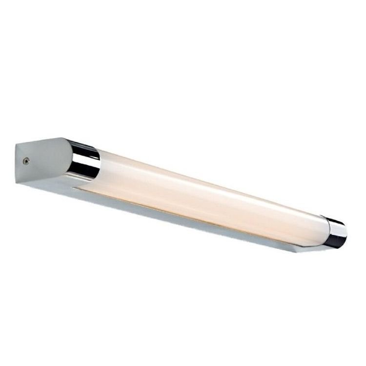 Lampa ścienna o cylindrycznym kształcie z chromowanymi elementami na końcach. Emituje miękkie, białe światło.