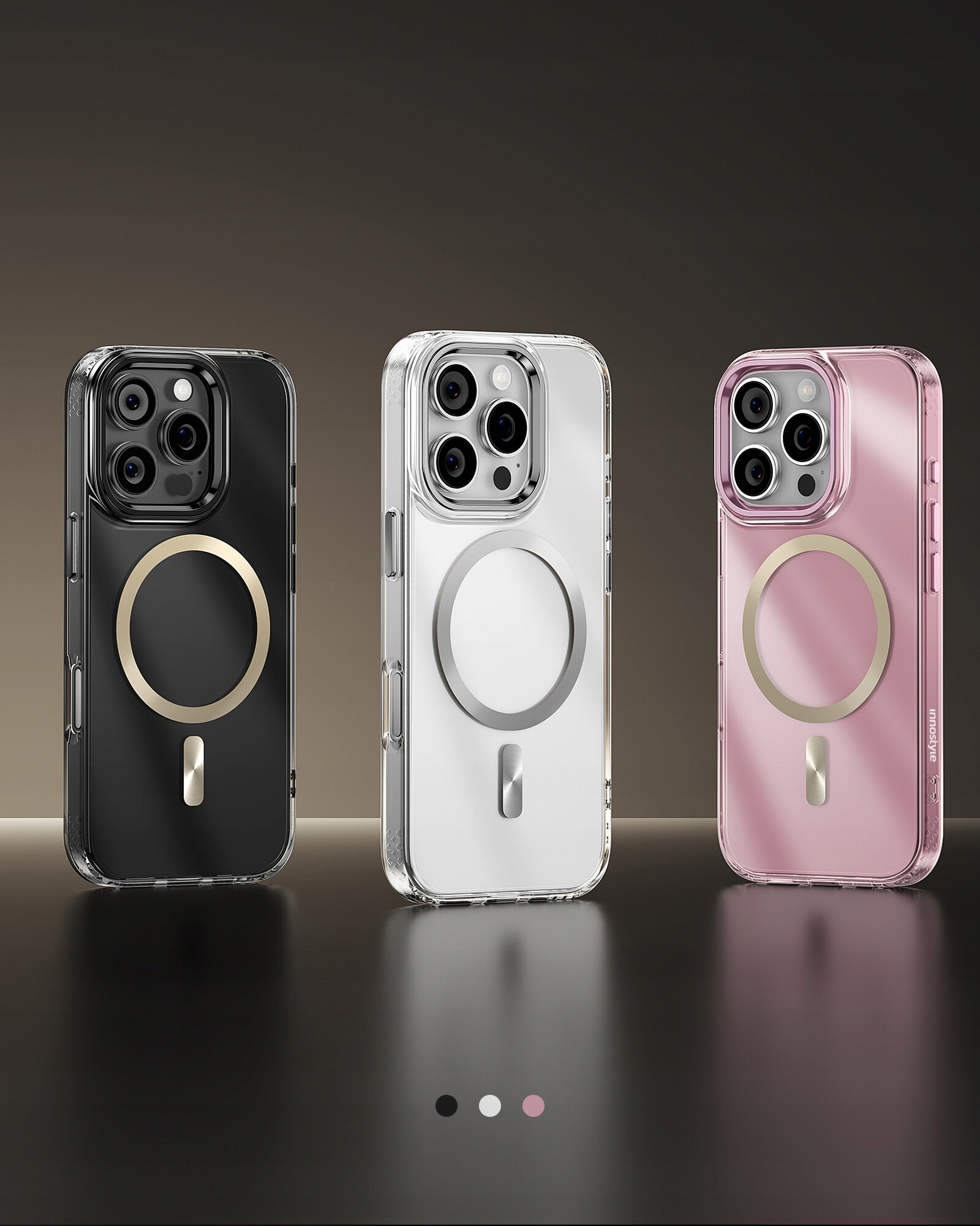 Trzy etui na telefon w kolorach czarnym, białym i różowym, każde z okrągłym wzorem na tylnej części. Etui mają przezroczyste krawędzie i są przeznaczone do iPhone 16 Pro.