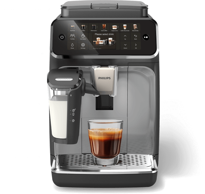 Ekspres do kawy z wyświetlaczem dotykowym, na którym widoczny jest napis \'Please select drink\'. Na przodzie urządzenia znajduje się logo \'PHILIPS\' oraz szklanka z kawą.
