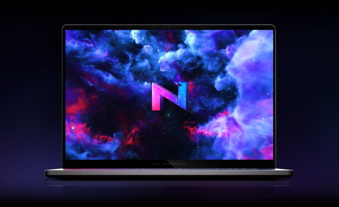 Laptop ASUS ROG Zephyrus z ekranem OLED wyświetla kolorową grafikę na ciemnym tle podczas gamingu i pracy kreatywnej 