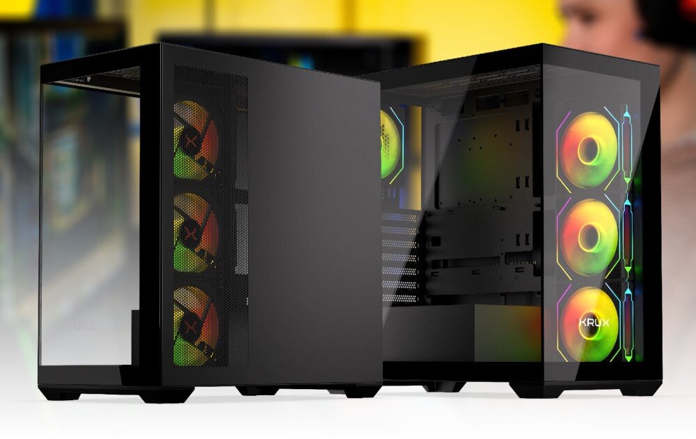 Obraz przedstawia dwa czarne obudowy komputerowe z przezroczystymi panelami, przez które widać kolorowe wentylatory RGB. Na jednym z wentylatorów widoczne jest logo \'KRUX\'.