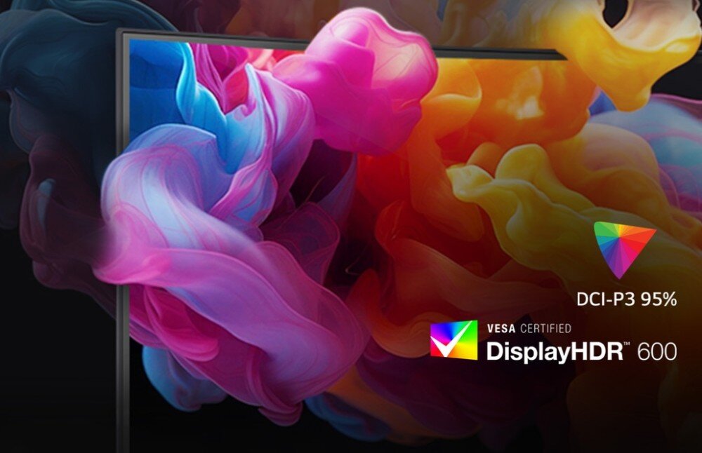 Obraz przedstawia fragment monitora z kolorowymi, abstrakcyjnymi wzorami na ekranie. Widoczne są napisy: \'DCI-P3 95%\' oraz \'VESA CERTIFIED DisplayHDR 600\'.