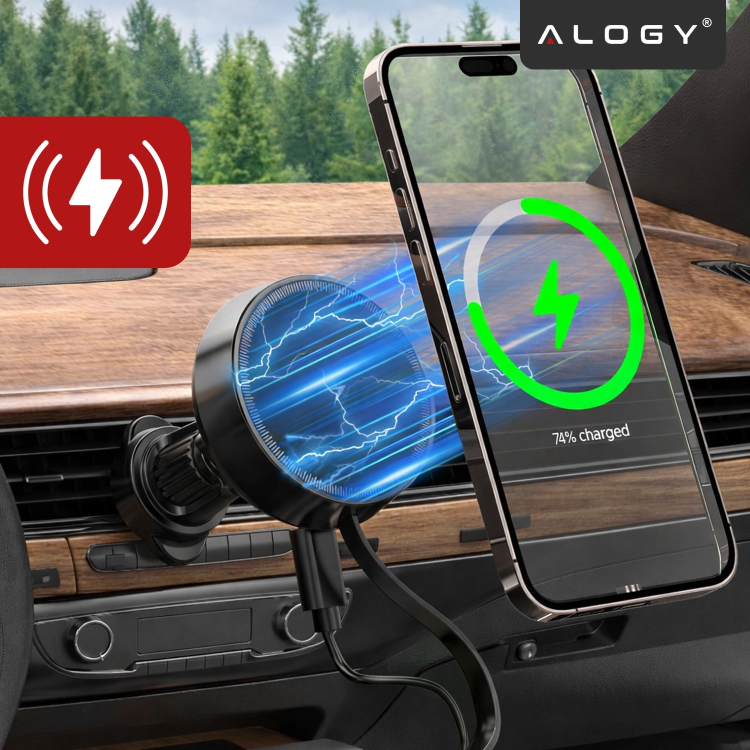 Obraz przedstawia uchwyt samochodowy do kratki wentylacyjnej z zamocowanym telefonem, który jest ładowany indukcyjnie. Na ekranie telefonu widoczny jest zielony symbol ładowania i napis \'74% charged\'.