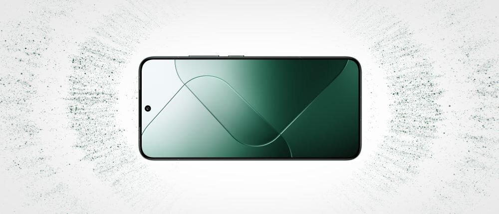 Smartfon z dużym ekranem, na którym widoczny jest abstrakcyjny wzór w odcieniach zieleni. Tło jest jasne z delikatnym efektem rozpraszania po bokach.