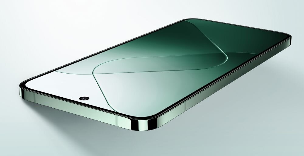 Smartfon z dużym ekranem, na którym widoczny jest abstrakcyjny wzór w odcieniach zieleni. Urządzenie ma metaliczną ramkę i minimalistyczny design.