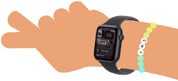 Smartwatch z ciemnym paskiem i wyświetlaczem pokazującym różne aplikacje. Widoczne kolorowe kółka z numerami od 1 do 5.