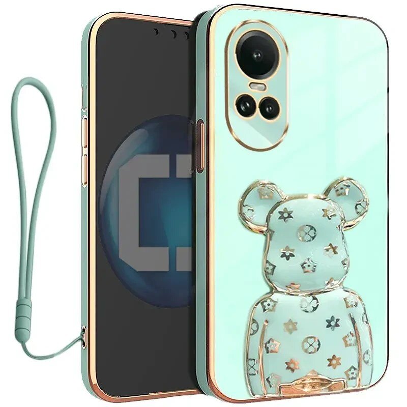 Etui na telefon w kolorze miętowym z ozdobnym motywem misia i złotymi elementami. Do etui dołączony jest uchwyt w formie smyczy.