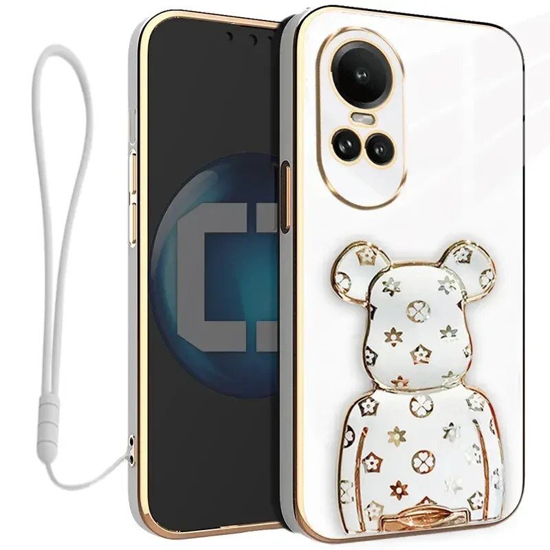 Etui na telefon z motywem misia ozdobionego wzorami, z widocznym uchwytem i smyczą. Telefon w etui ma widoczny aparat z trzema obiektywami.