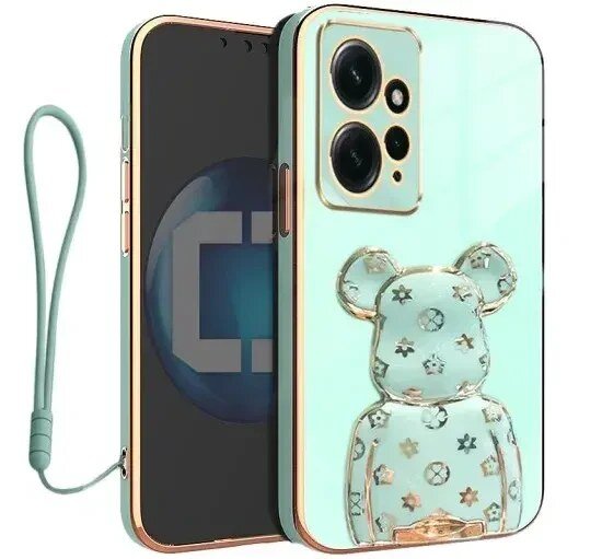 Etui na telefon z motywem misia i wzorami gwiazdek, w zestawie z uchwytem i smyczą w kolorze miętowym.