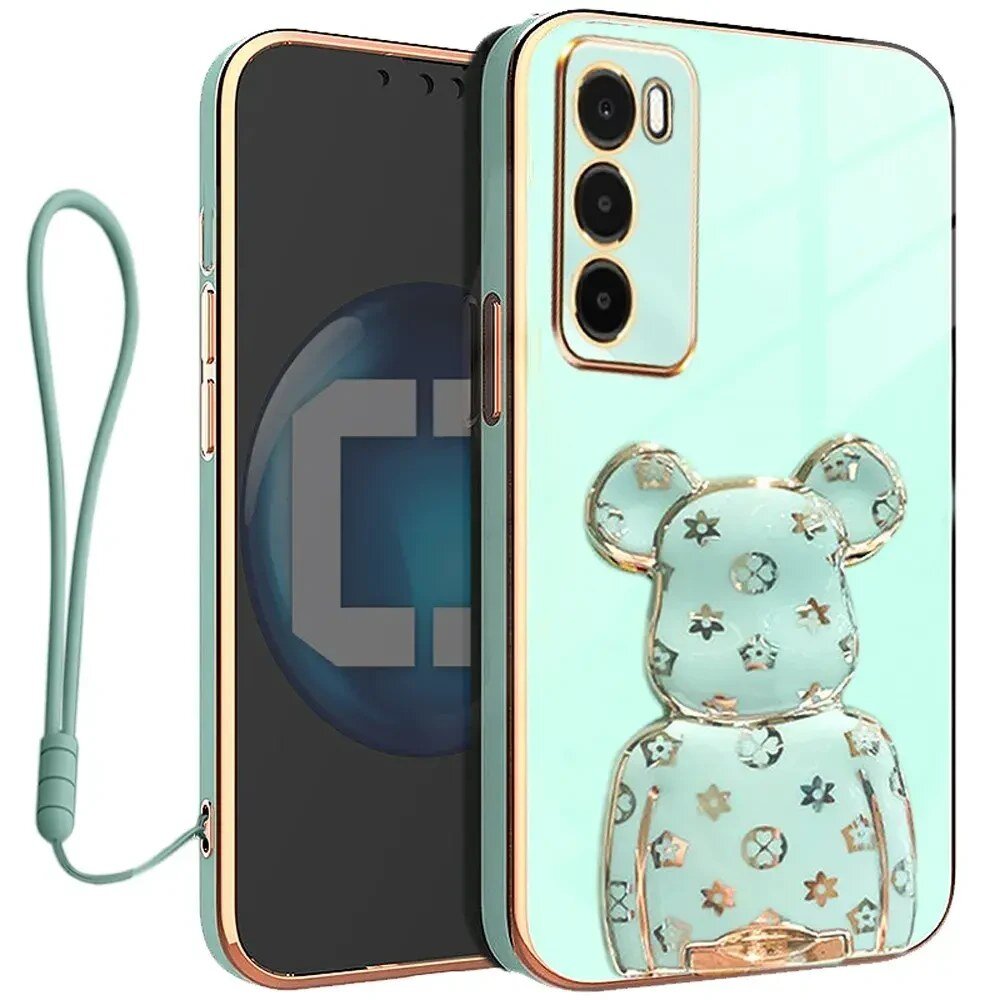 Etui na telefon w kolorze miętowym z ozdobnym wzorem misia i złotymi akcentami. Do etui dołączona jest smycz w dopasowanym kolorze.