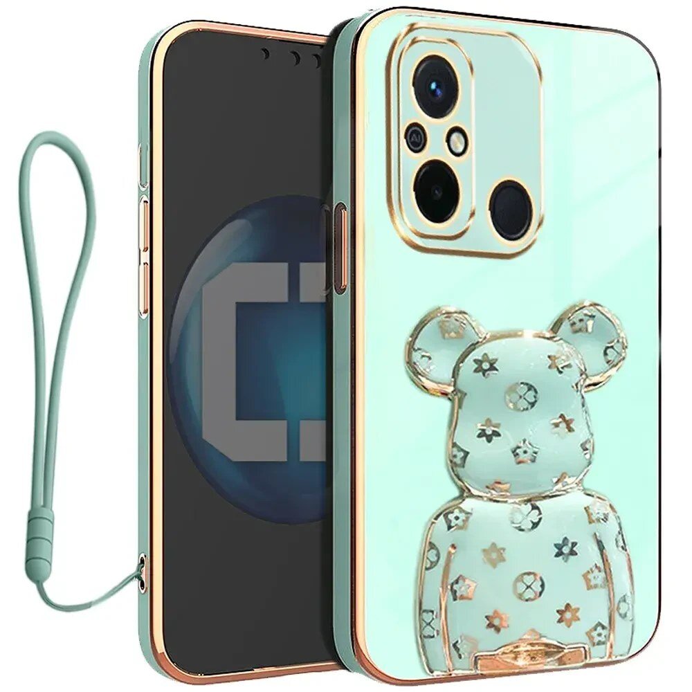 Etui na telefon w kolorze miętowym z ozdobnym motywem misia i złotymi akcentami. Do etui dołączona jest smycz w tym samym kolorze.
