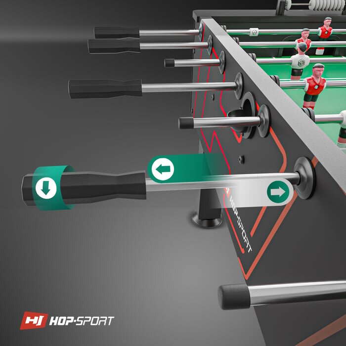 Stół do piłkarzyków z czarnymi i czerwonymi elementami oraz logo \'HOP-SPORT\'. Widoczne są uchwyty i figurki piłkarzy w czerwonych strojach na zielonym boisku.