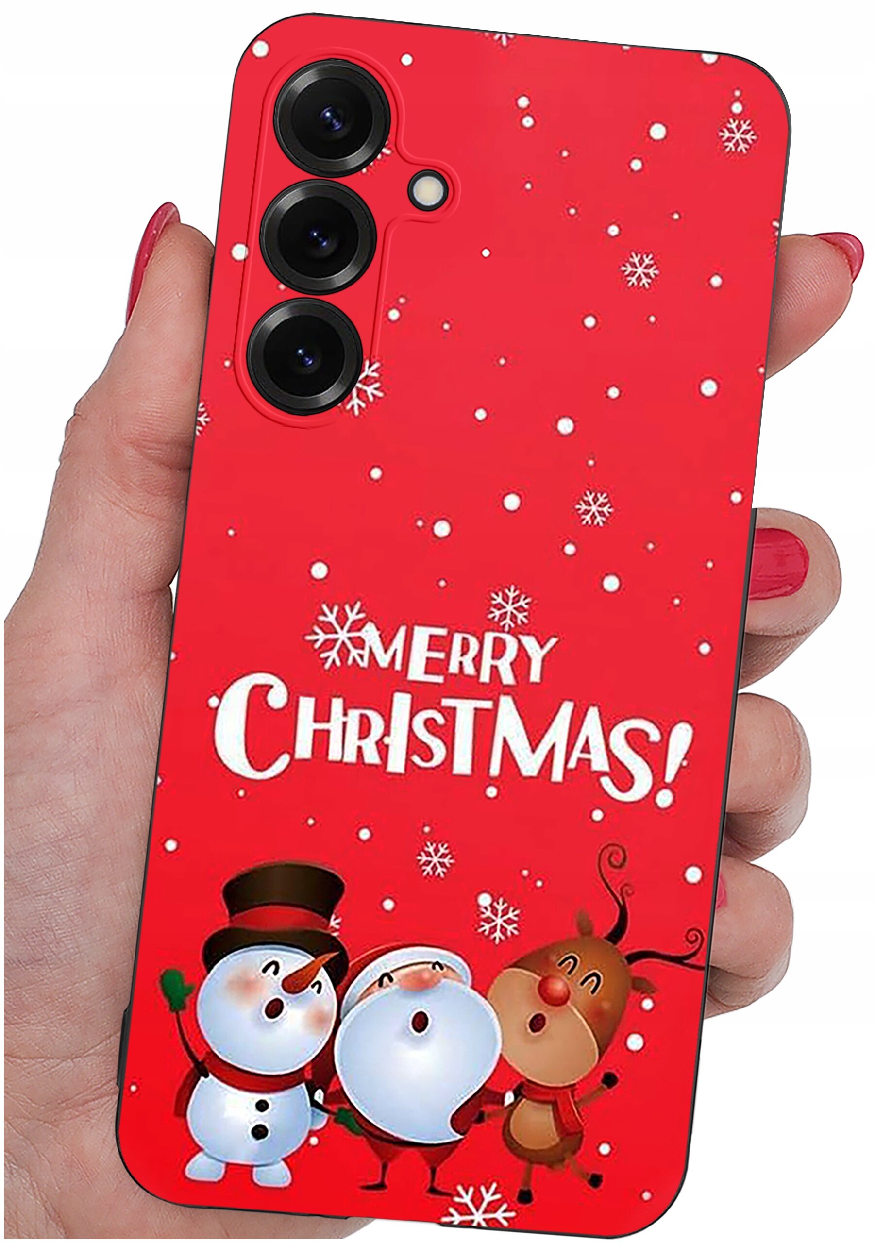 Czerwone etui na telefon z napisem \'Merry Christmas!\' oraz grafiką przedstawiającą bałwanka, Mikołaja i renifera. Etui trzymane jest w dłoni, a na powierzchni widoczne są białe płatki śniegu.