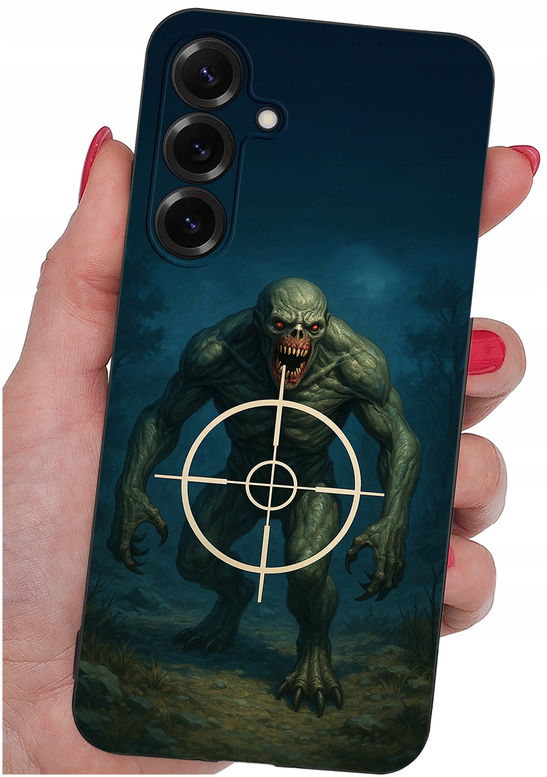 Etui na telefon z grafiką przedstawiającą potwora z czerwonymi oczami i otwartymi ustami, na tle ciemnego lasu. Na środku etui znajduje się celownik.
