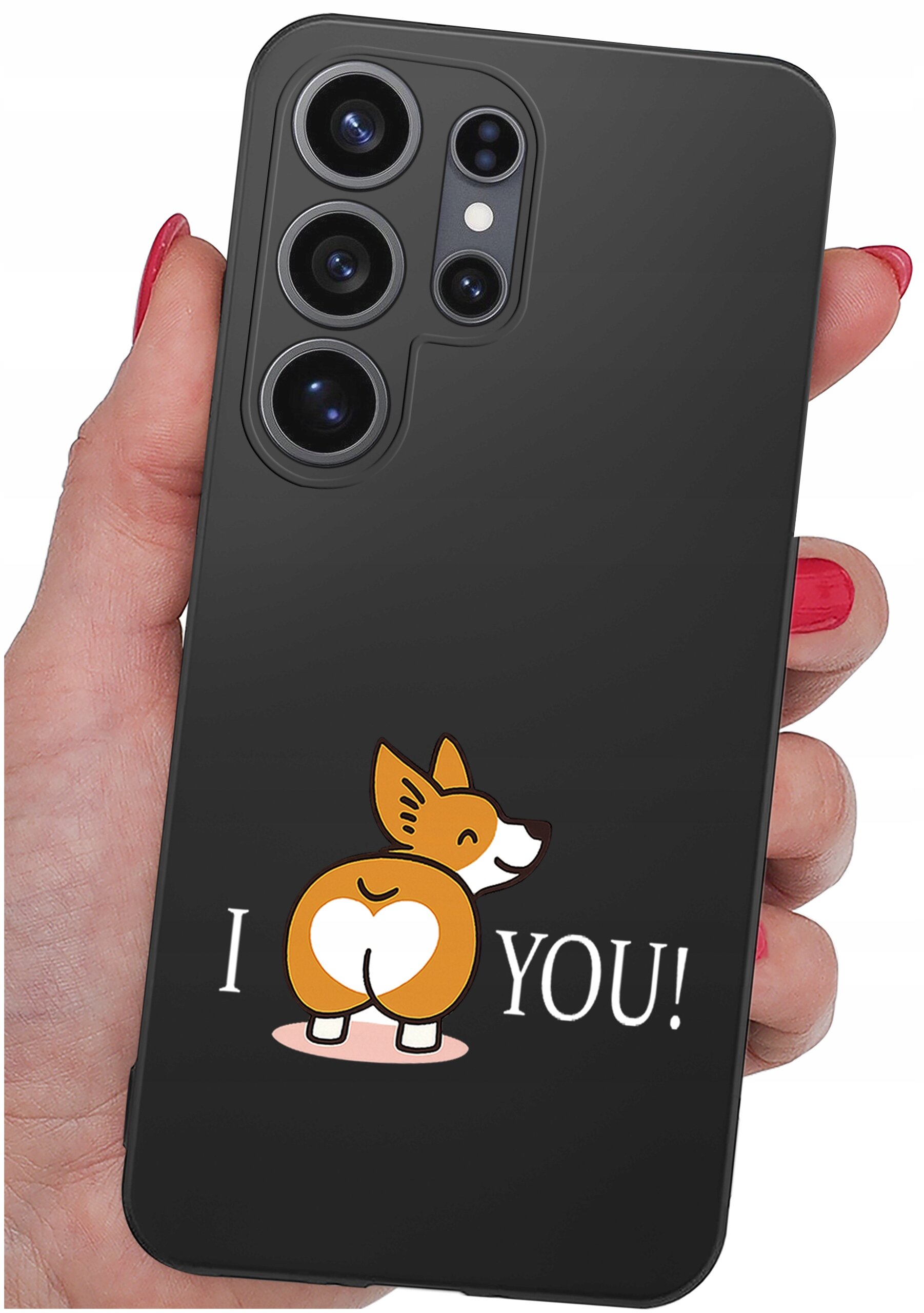 Czarna obudowa telefonu z nadrukiem przedstawiającym psa z sercem na tylnej części ciała oraz napisem \'I ❤️ YOU!\'. Obudowa jest trzymana w dłoni z pomalowanymi na czerwono paznokciami.