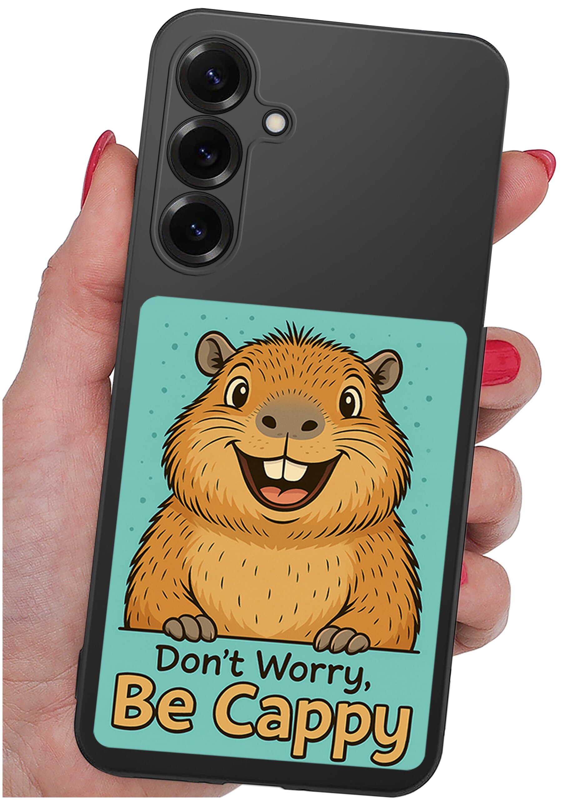 Etui na telefon z grafiką uśmiechniętej kapibary i napisem \'Don\'t Worry, Be Cappy\'.