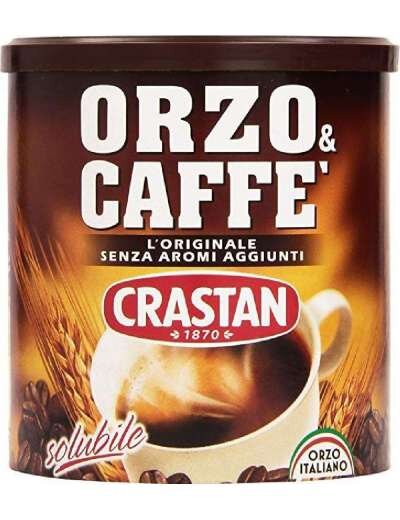 Opakowanie kawy rozpuszczalnej z napisem \'ORZO & CAFFE\' L\'ORIGINALE SENZA AROMI AGGIUNTI\'. Widoczne logo \'CRASTAN 1870\' oraz ilustracja filiżanki z kawą.