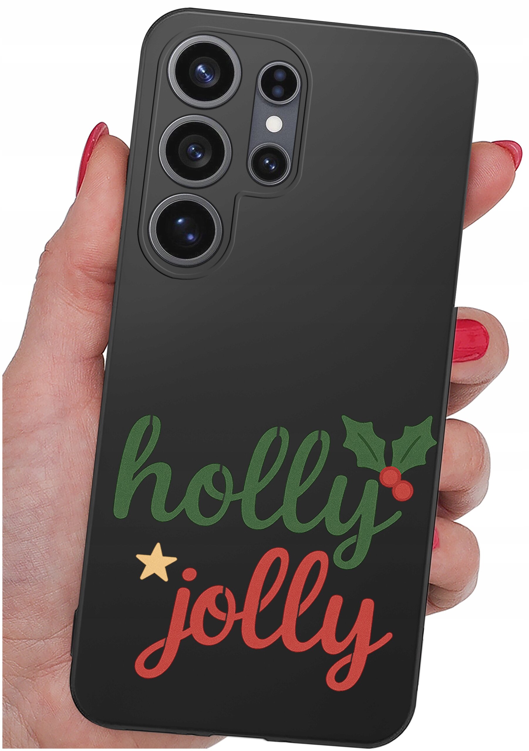 Czarna obudowa telefonu z napisem \'holly jolly\' w kolorach zielonym i czerwonym oraz grafiką ostrokrzewu. Obudowa trzymana jest w dłoni z pomalowanymi na czerwono paznokciami.