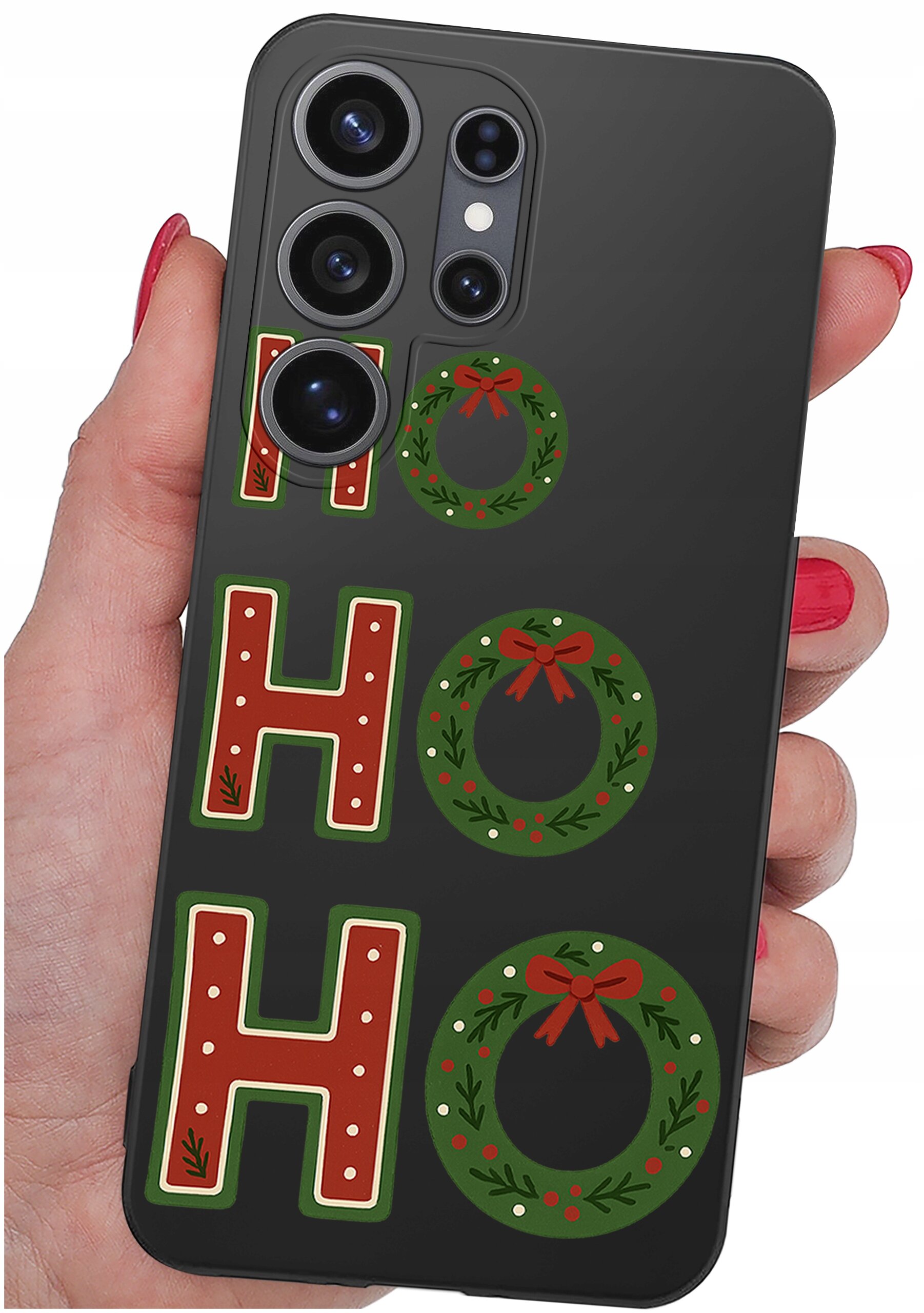 Czarny silikonowy etui na telefon z trzema dużymi aparatami, ozdobione napisem \'HO HO HO\' z elementami świątecznymi, takimi jak wieńce i kokardy.