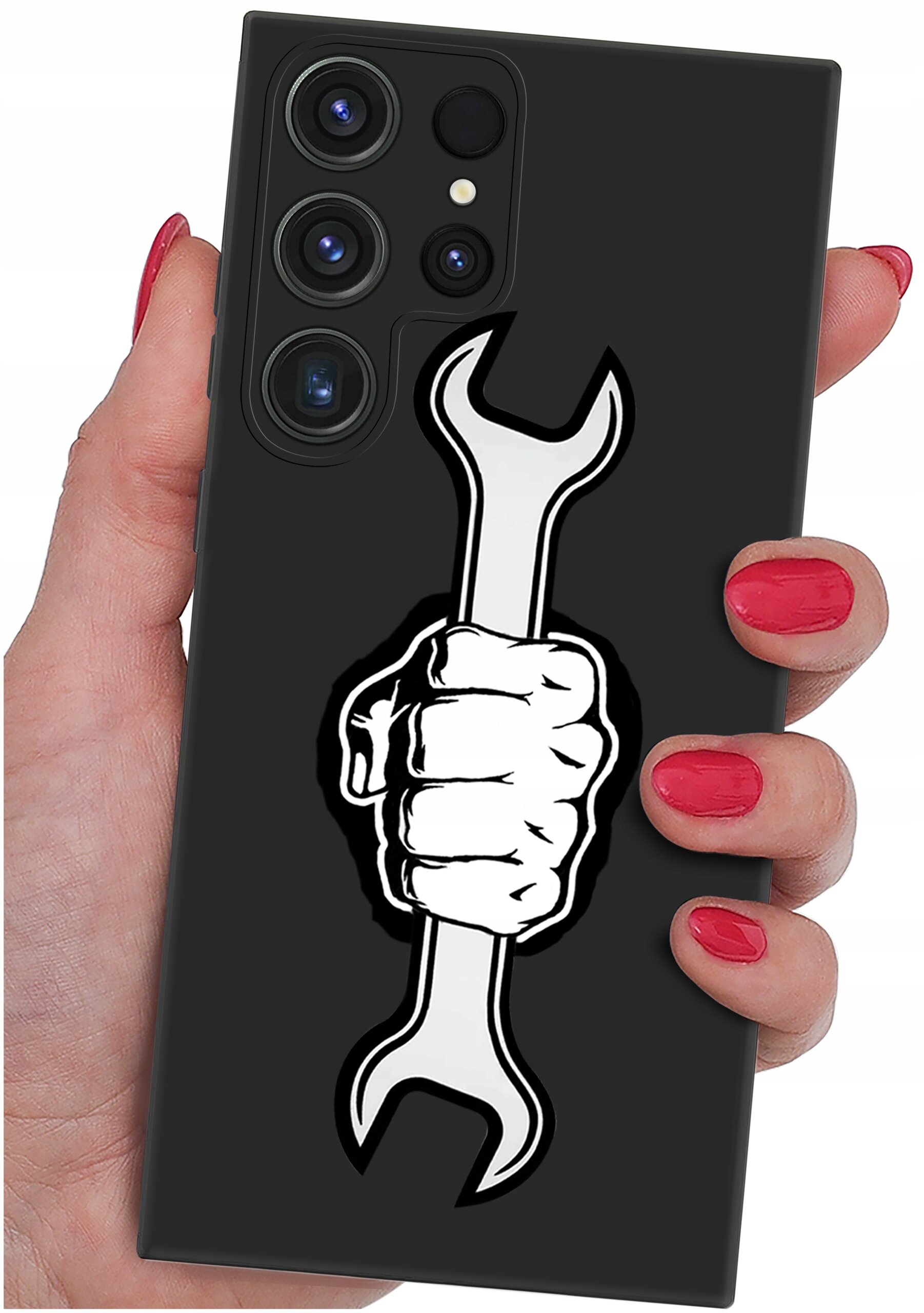 Czarna obudowa telefonu z nadrukiem białej dłoni trzymającej klucz. Telefon jest trzymany w dłoni z pomalowanymi na czerwono paznokciami.