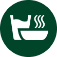Ikona przedstawia biały symbol parującej miski i szklanki na ciemnozielonym tle.